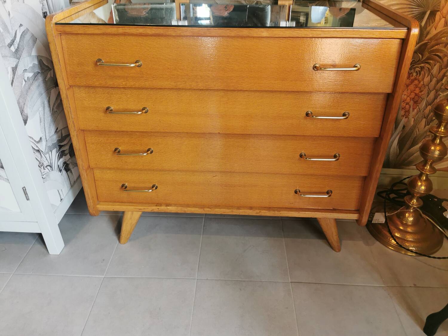 Vintage chest of drawers with compass legs and triptych mirror
