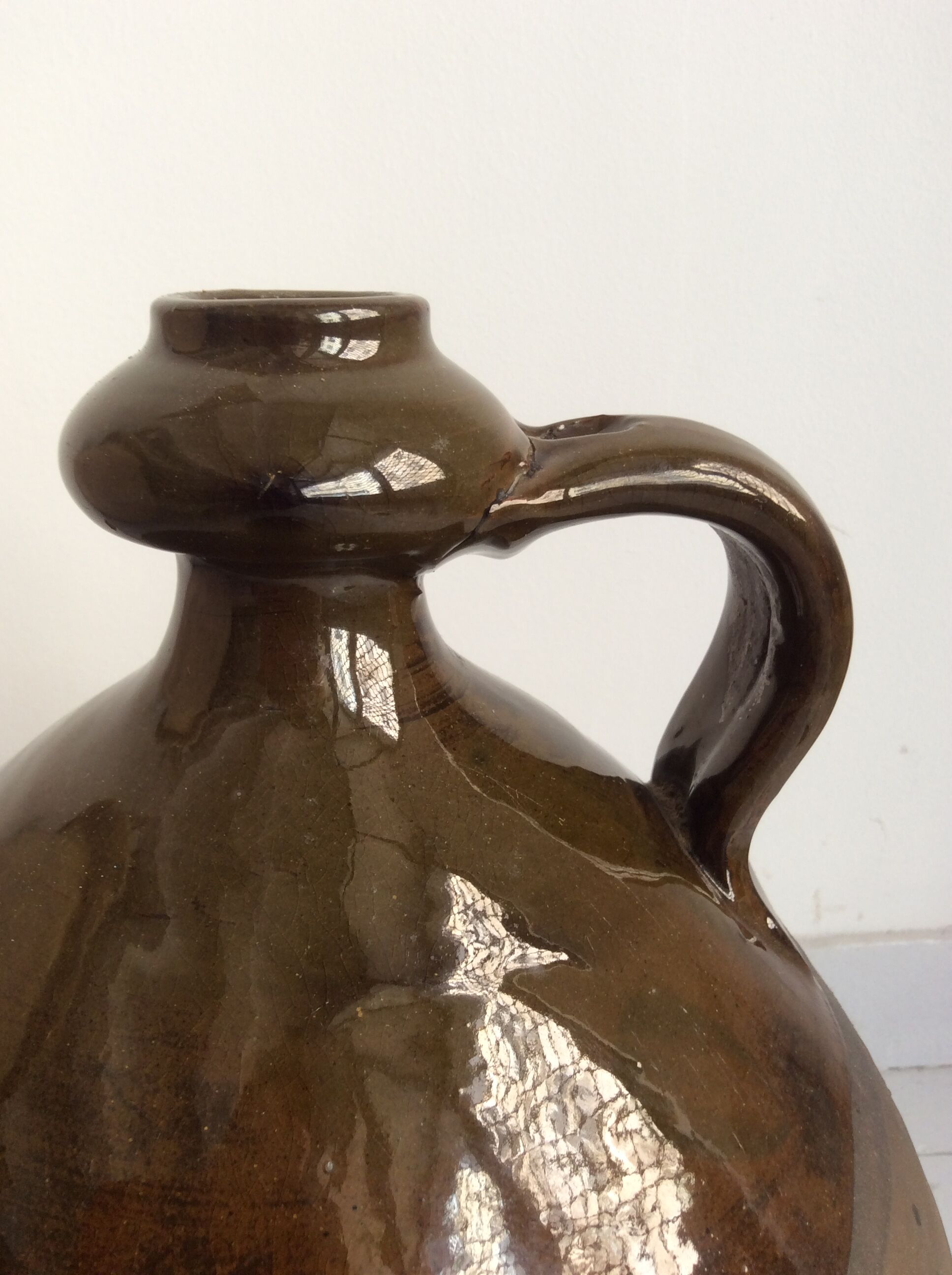 Old terracotta jug glazed Provençal