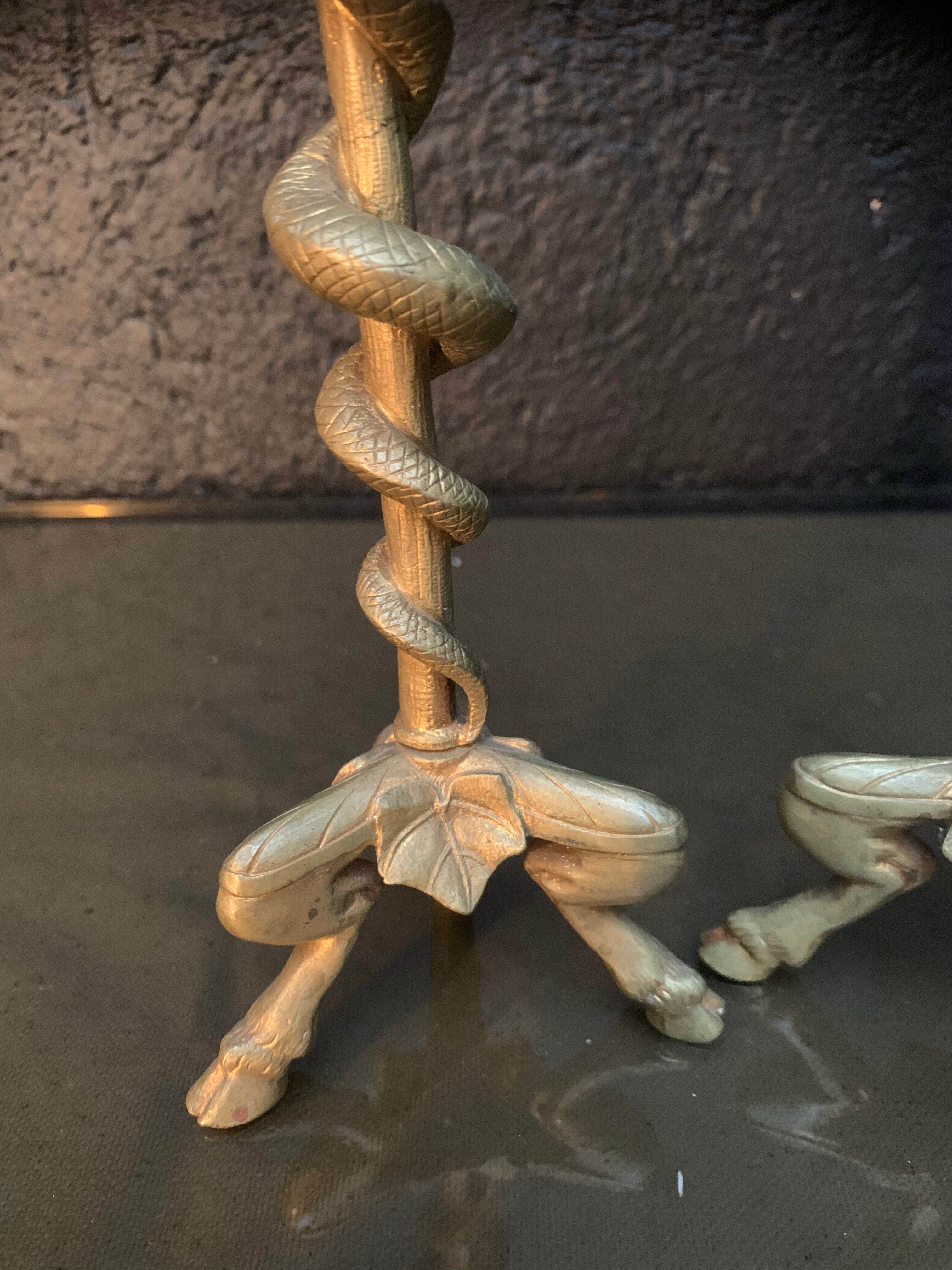 Pair of candlesticks with snakes, gilded bronze 19th century