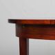 Round extendable dining table in Rio rosewood, 1960