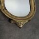 Petit miroir Louis XV en bois doré à coquille