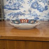 Assiette en porcelaine Imari signée à décor japonisant lacustre et biche, XIXème s.