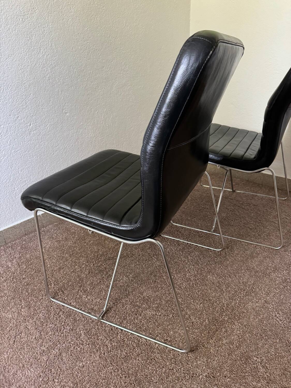 Black leather armchairs, Italian design, 70s (X2)