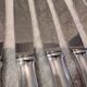 12 silver-plated metal table knives, Platil rocaille silversmith design, 24.6cm