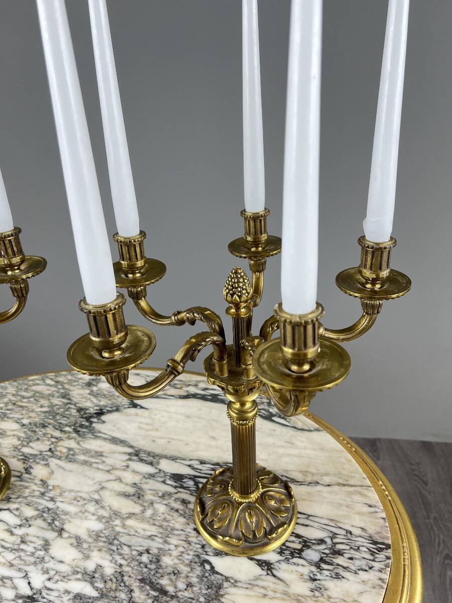 Pair of gilded bronze candelabra with 5 lights, Louis XVI style, 20th century.
