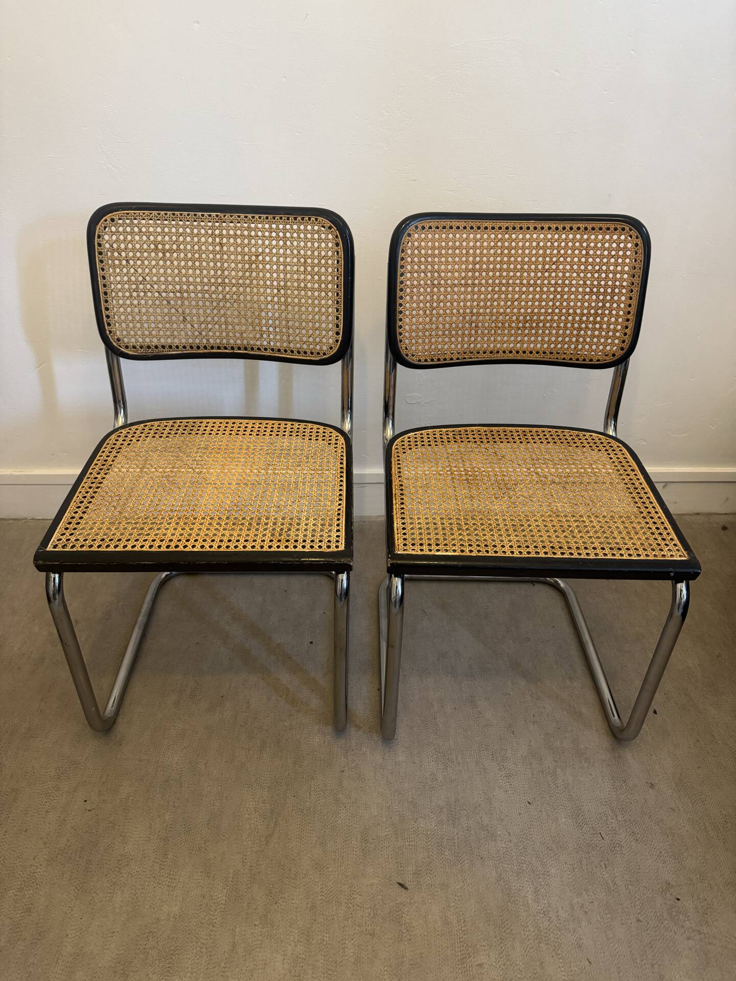 Pair of Marcel Breuer B32 Cesca chairs made in Italy.