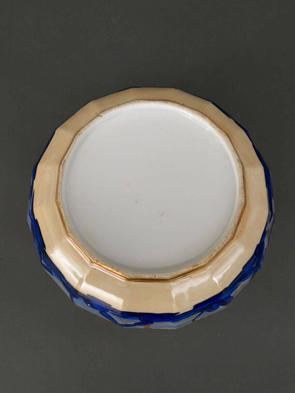 Japanese cup with cut sides, rich decoration with golden highlights, early 20th century