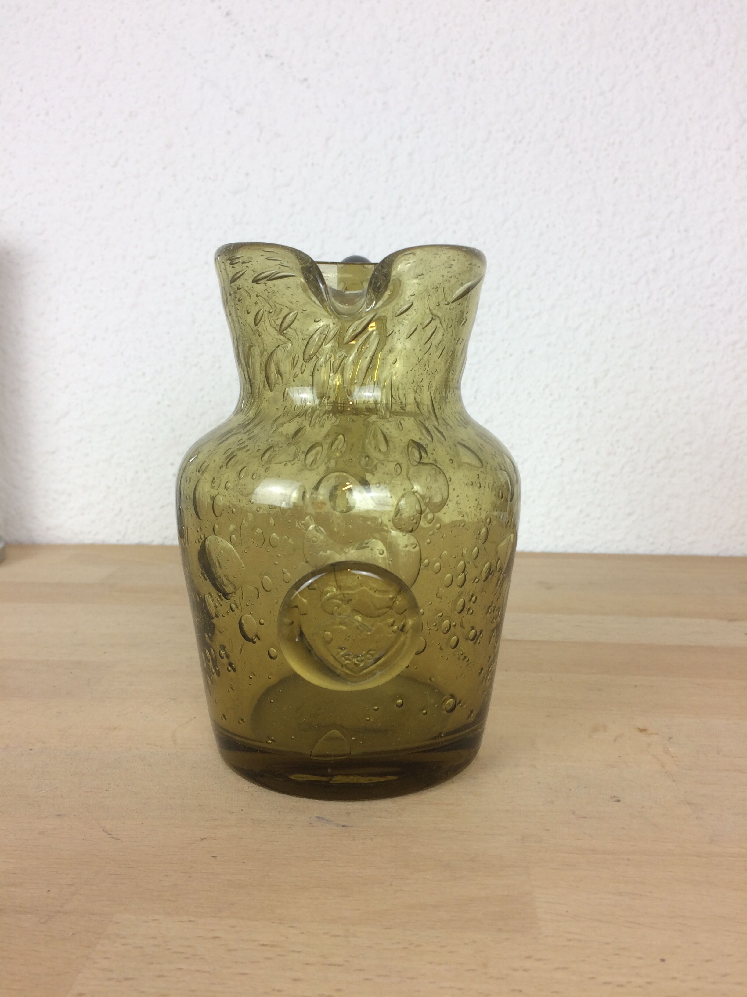 Green bubbled glass pitcher