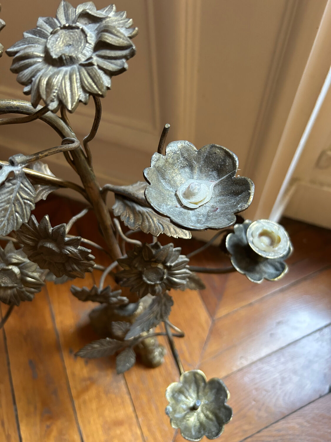 Antique metal candlestick with floral decoration – Mexico