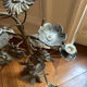 Antique metal candlestick with floral decoration – Mexico
