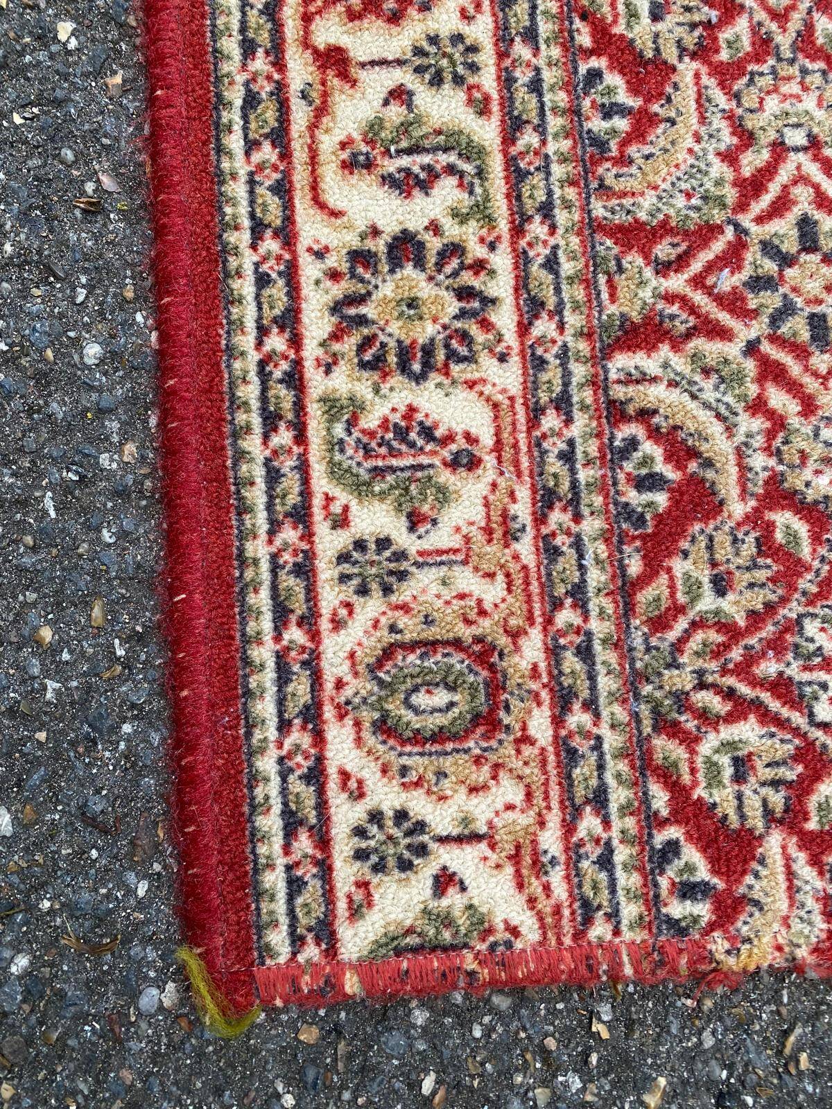 Long Persian rug in burgundy red wool with flowers, handmade 205x70