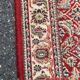 Long Persian rug in burgundy red wool with flowers, handmade 205x70