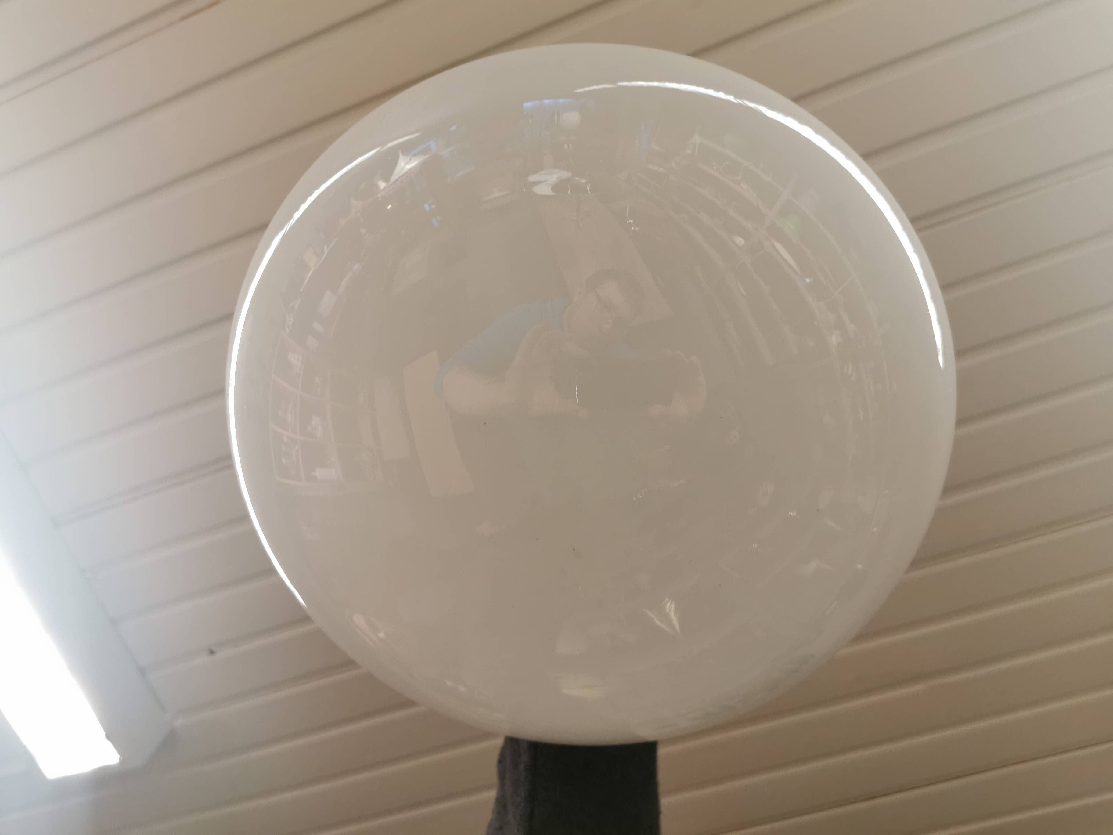 Older ceiling/hanging lamp in milky white opaline glass.