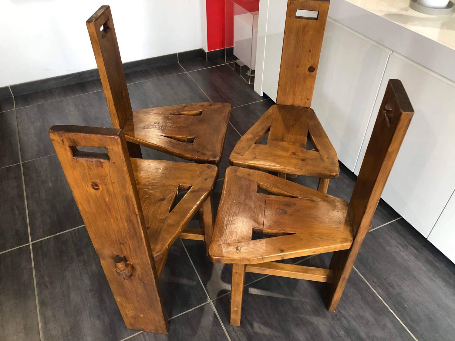 Suite of 4 brutalist-style tripod chairs