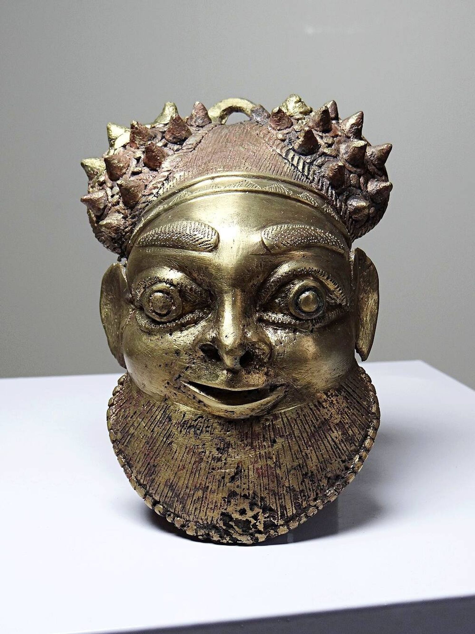 Small gilded bronze Oba mask from Bamoun, Cameroon, vintage Africa