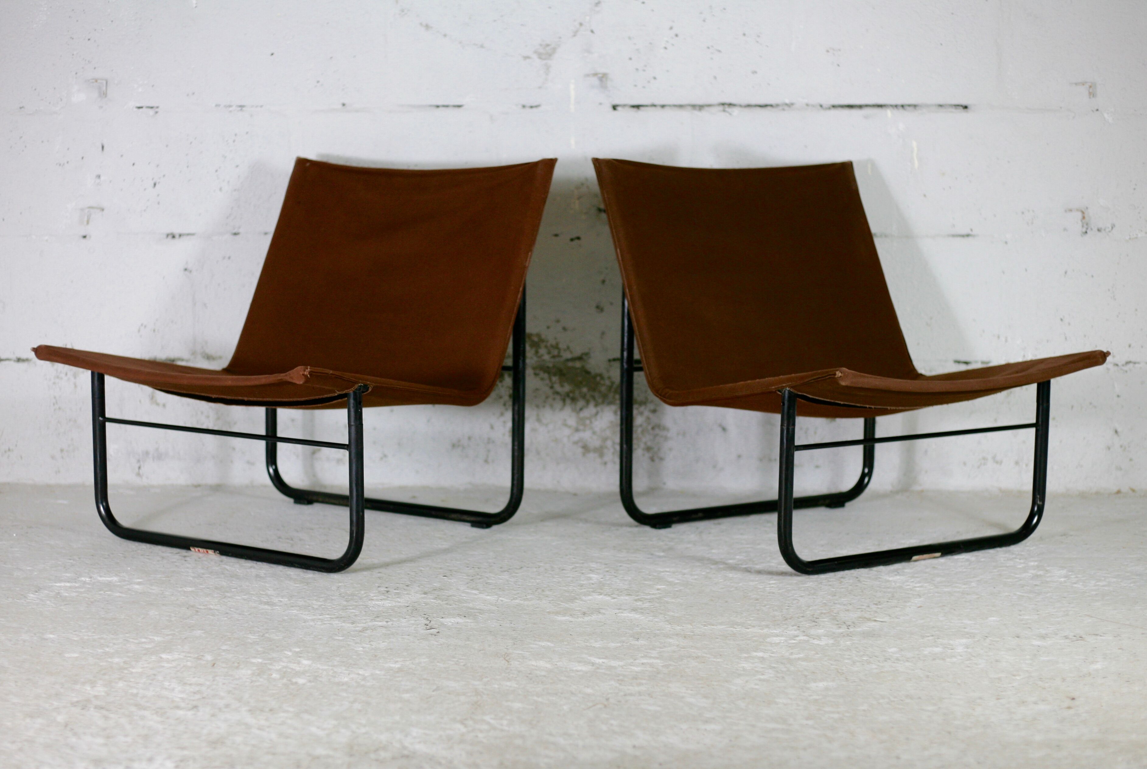 Pair of KEBE drivers, Denmark, circa 1975. Steel and "chocolate" canvas