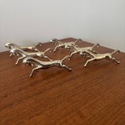 Set of 6 vintage galloping horse knife rests in silver-plated metal.