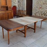 Extendable Art Nouveau table in carved walnut, circa 1900