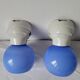 Duo of wall lamps in porcelain and blue opaline