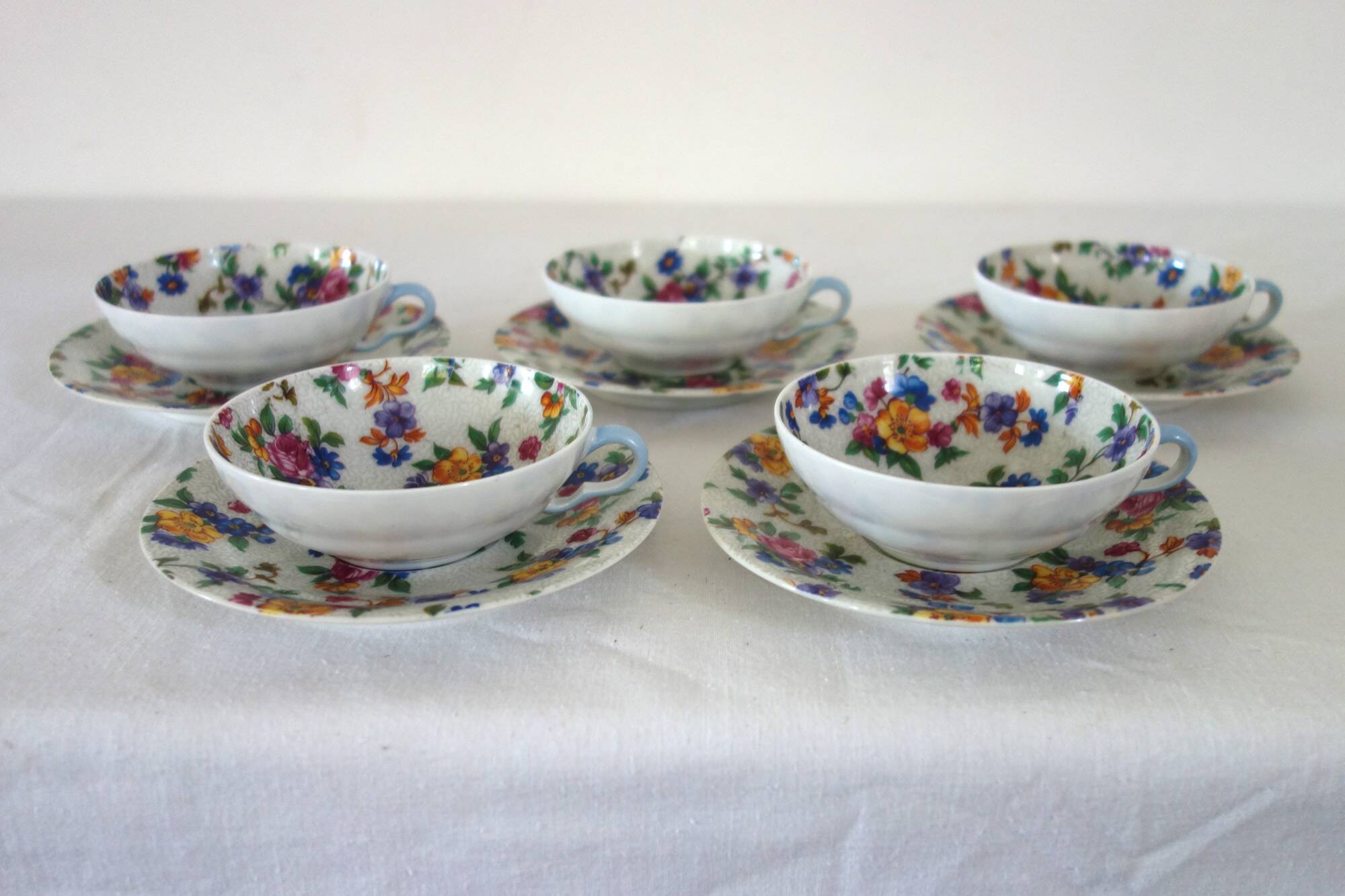 5 vintage flower pattern cups and saucers