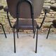 Brown faux leather armchairs
