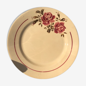 Lot of 12 dinner plates in faïence motif "roses" in bordeaux tones