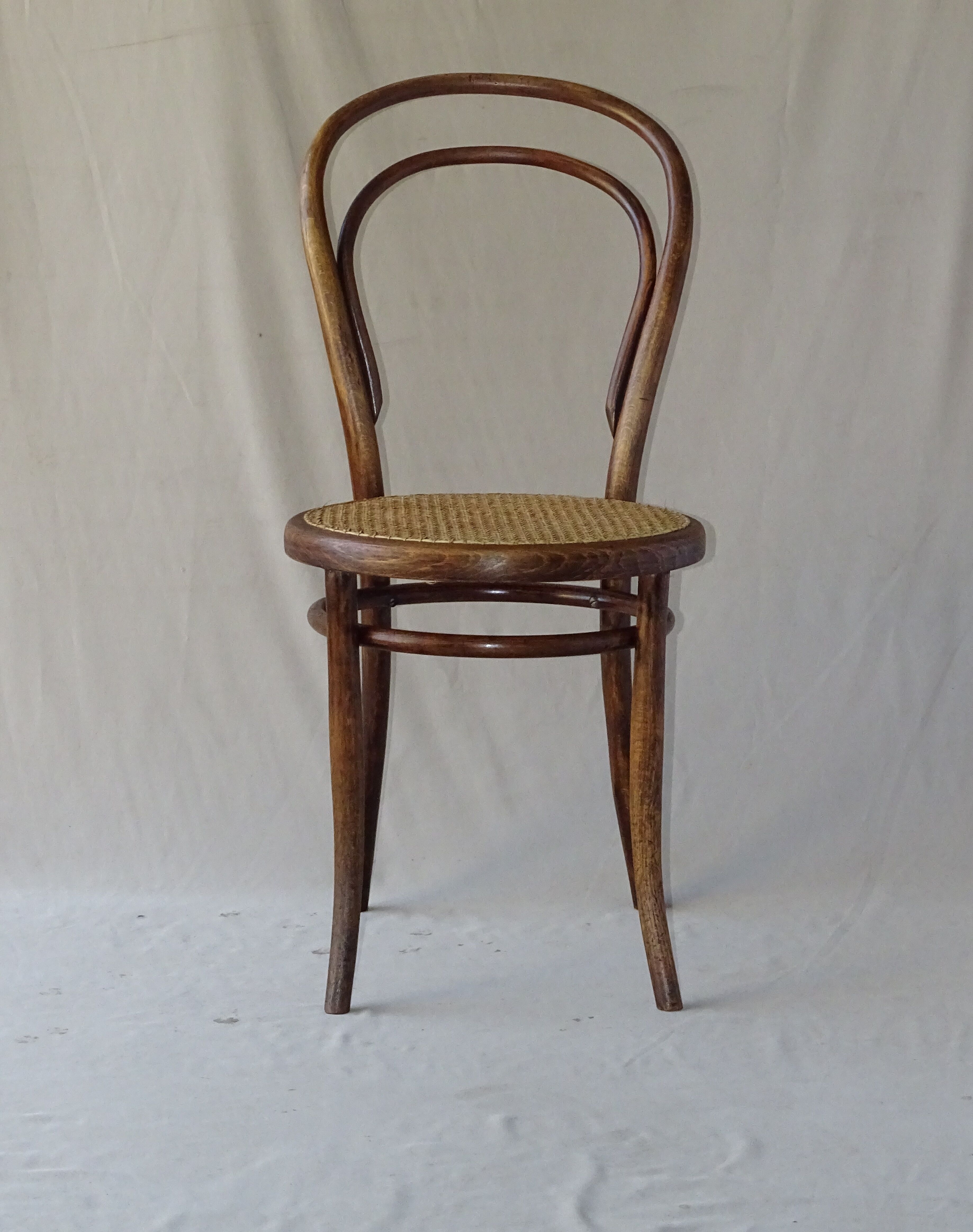 Two Turpe canned Bistro 1900 color rosewood chairs
