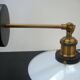 Pair of metal wall lamps in black and white color