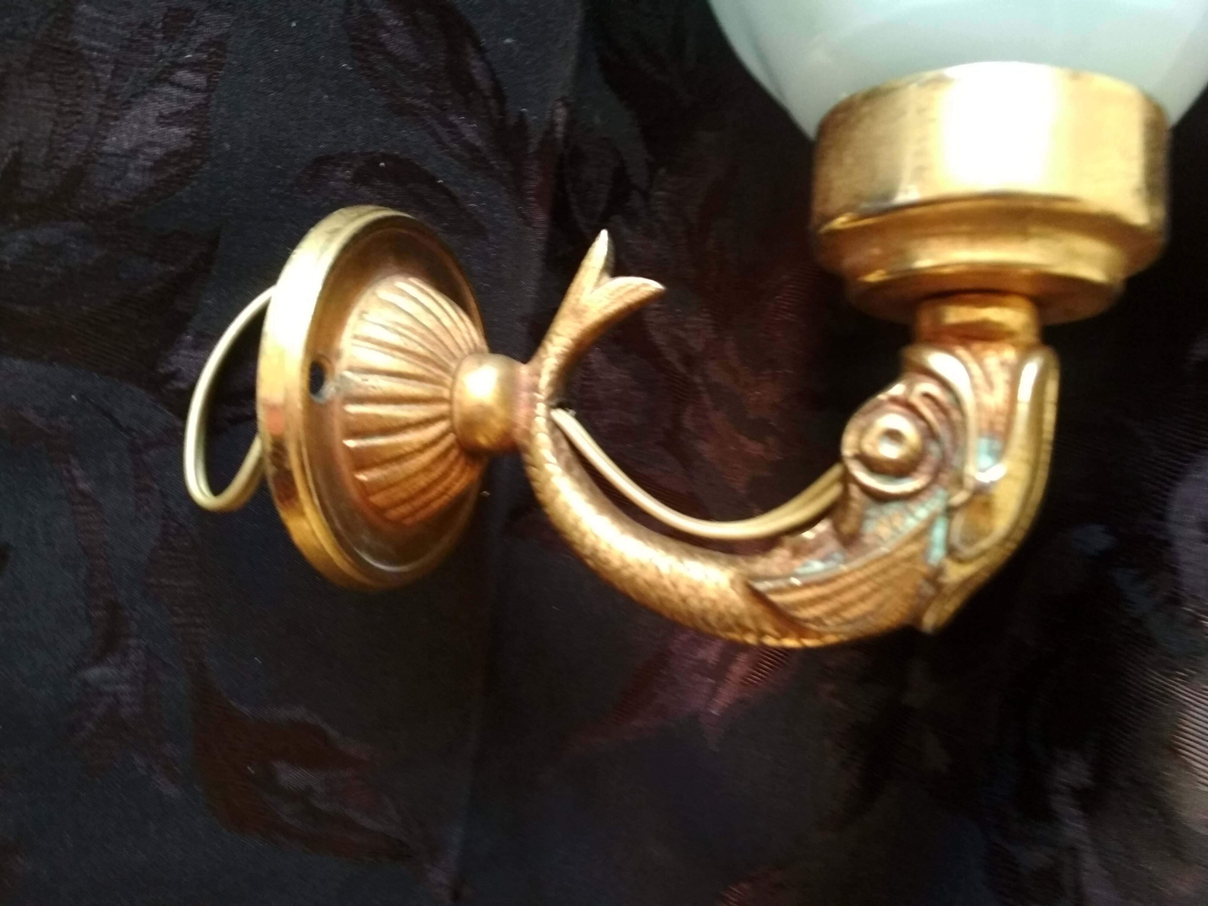 Golden brass wall light with glass tulip - dolphin pattern bathroom lamp