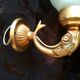 Golden brass wall light with glass tulip - dolphin pattern bathroom lamp