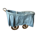 Old wooden cradle and wicker on wheels