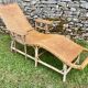 Chaise longue en rotin ancienne 20e siècle
