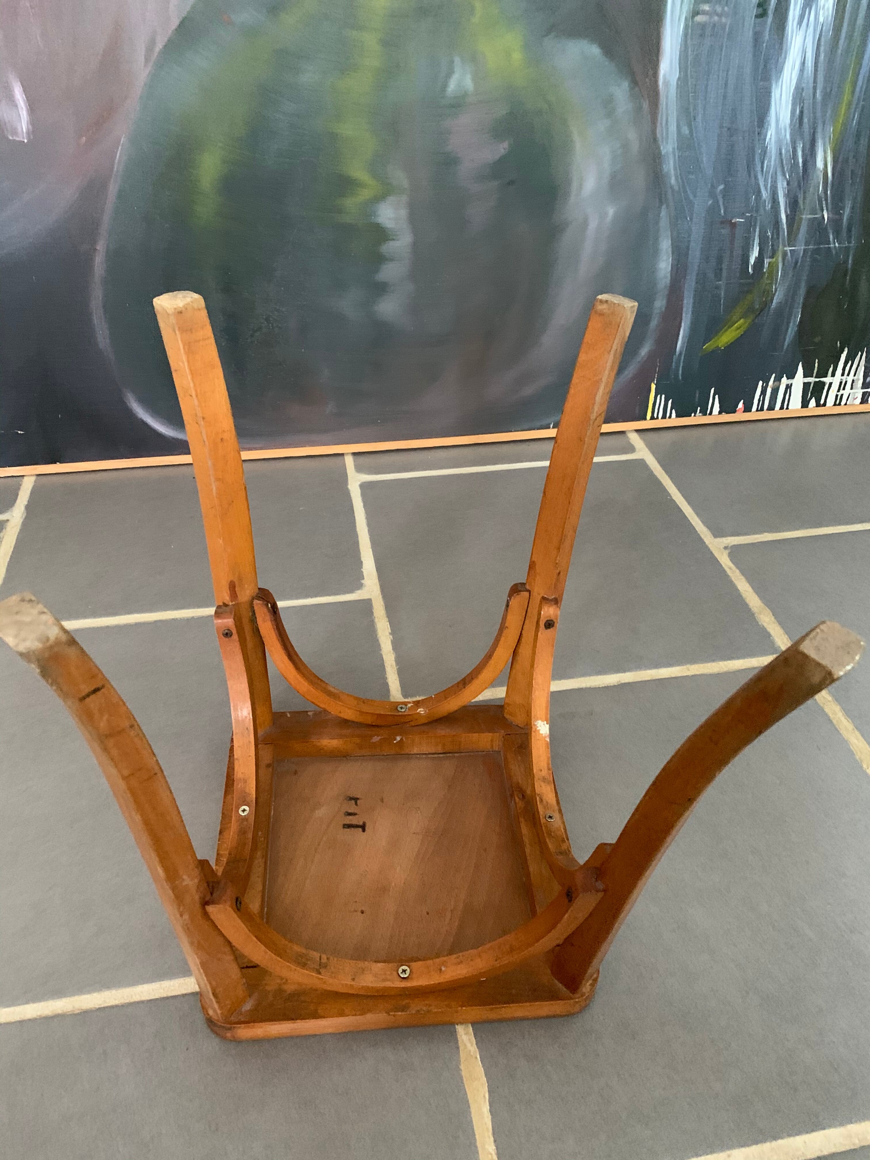 Vintage curved wooden stool