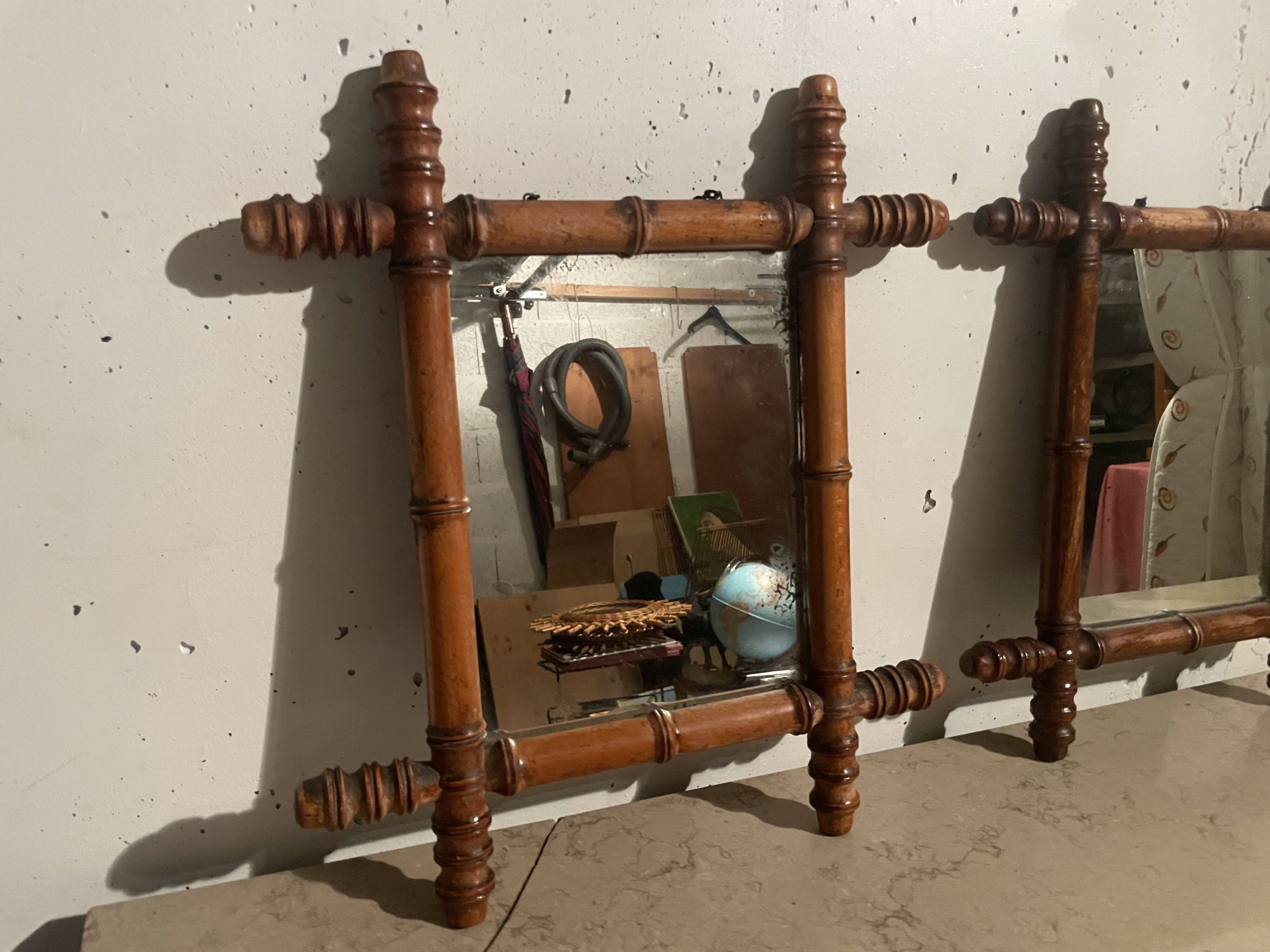 Pair of wooden mirrors from the 1940s.