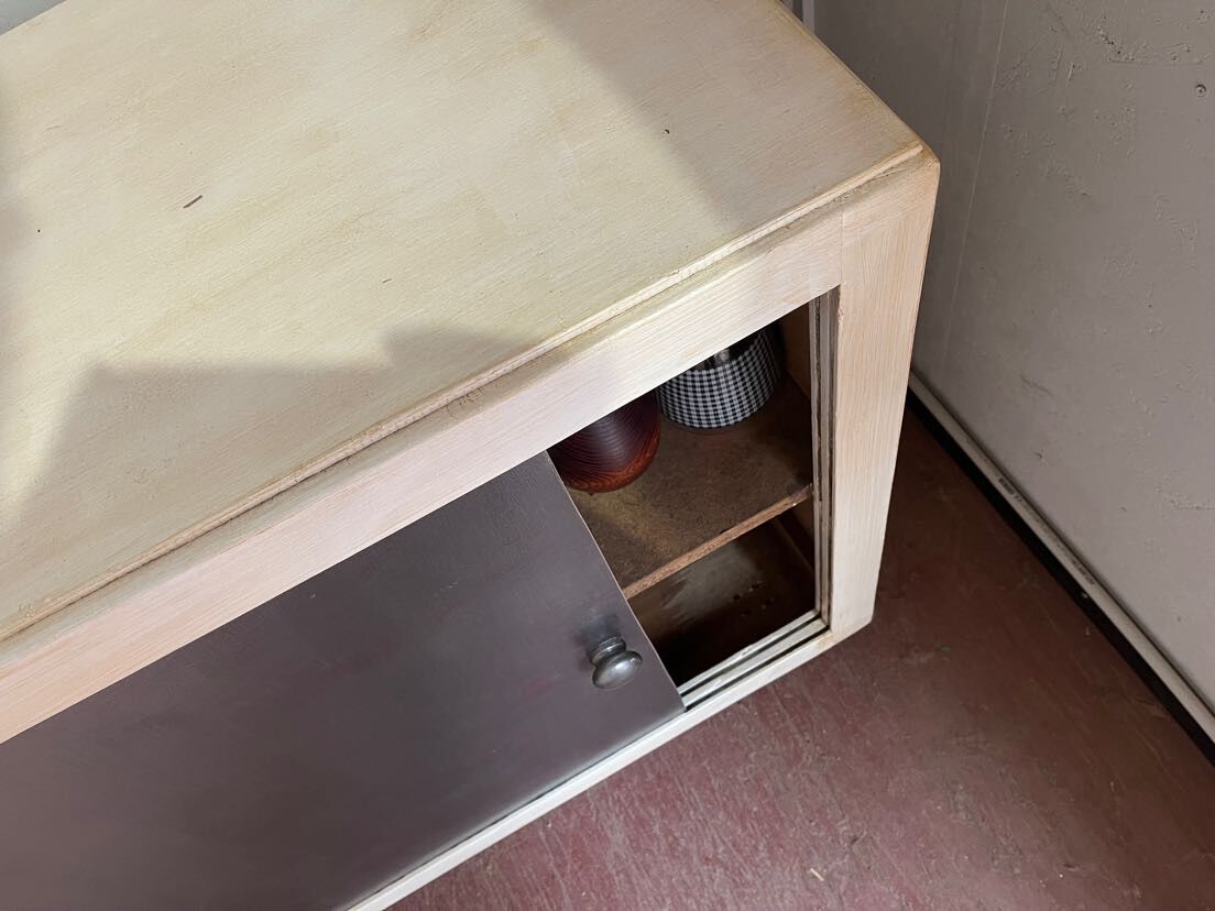 Storage cabinet sliding door