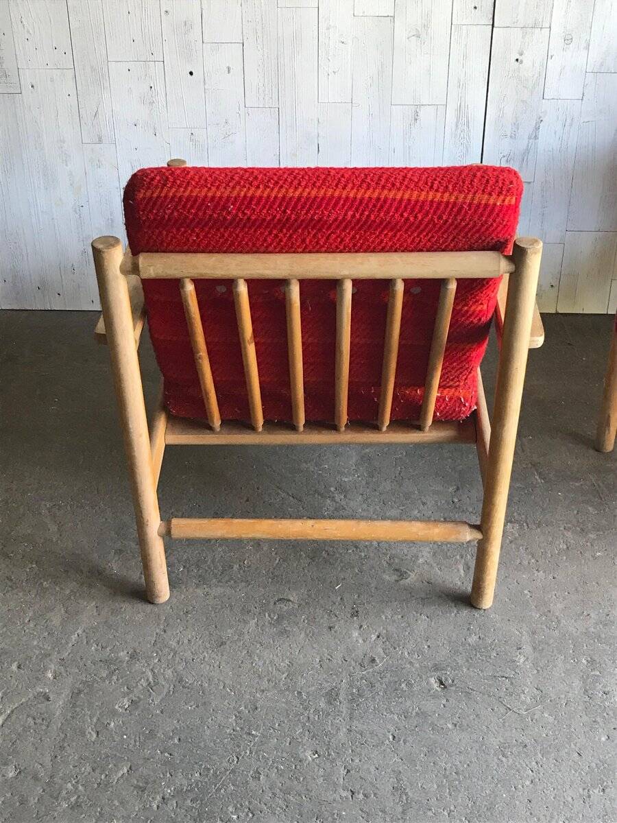 Set of mid-century red upholstered armchairs, 1960s Danish style.