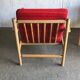 Set of mid-century red upholstered armchairs, 1960s Danish style.