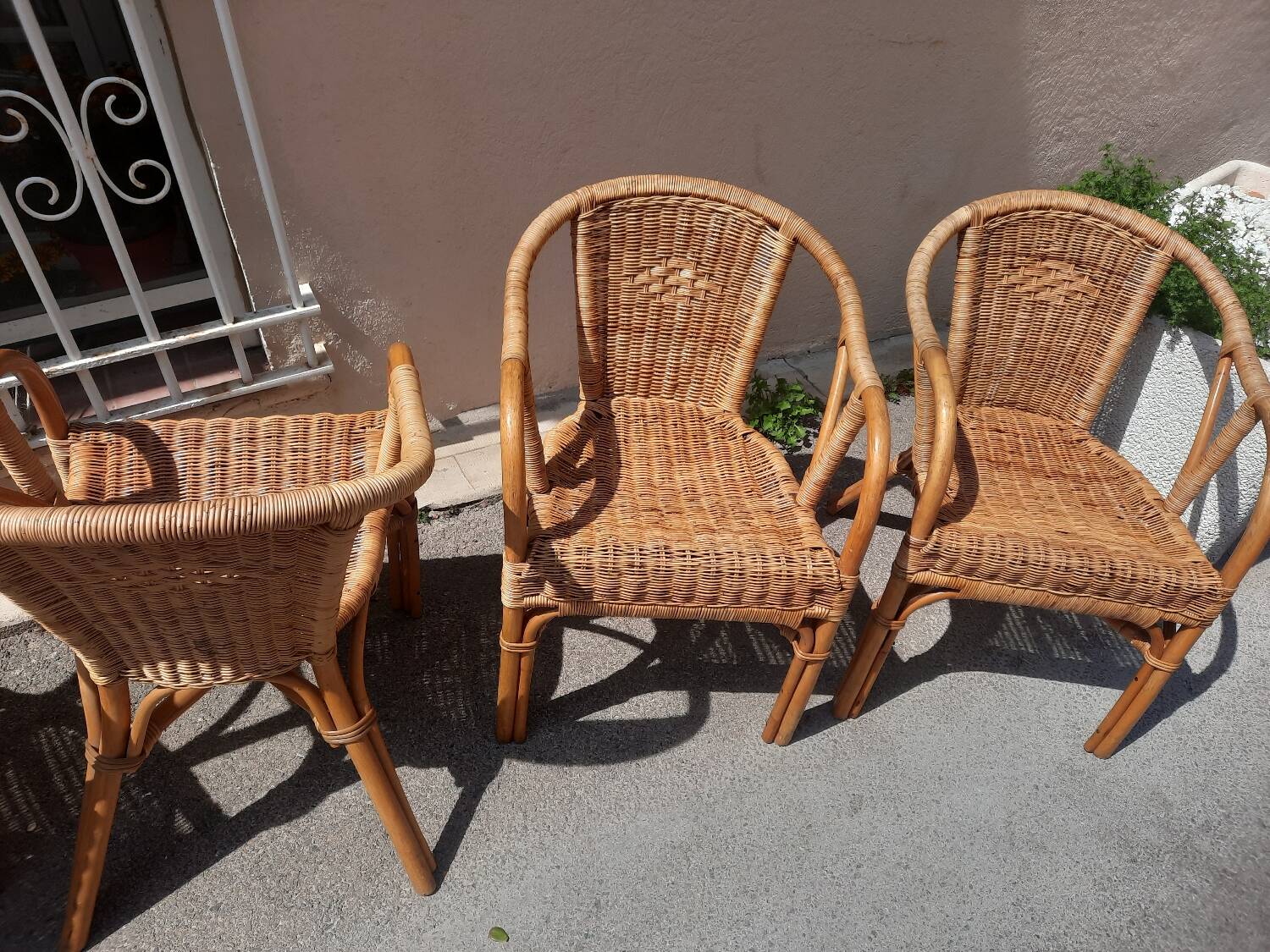 4 rattan armchairs