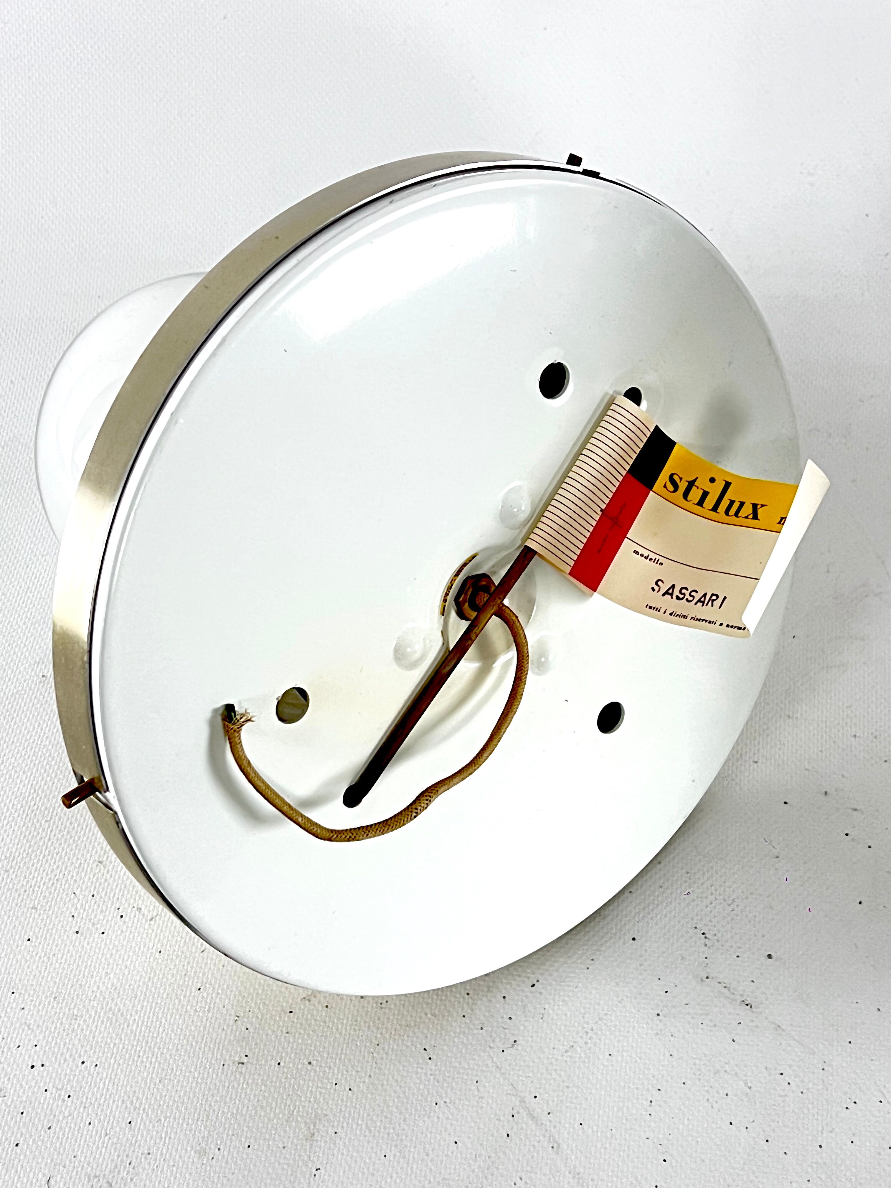 Stilux Milano, vintage round gilded aluminum wall lamps from 60s. Set of two