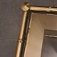 Nesting bamboo tables with gold-plated brass trim