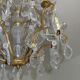 Bronze and crystal chandelier with six arms of light