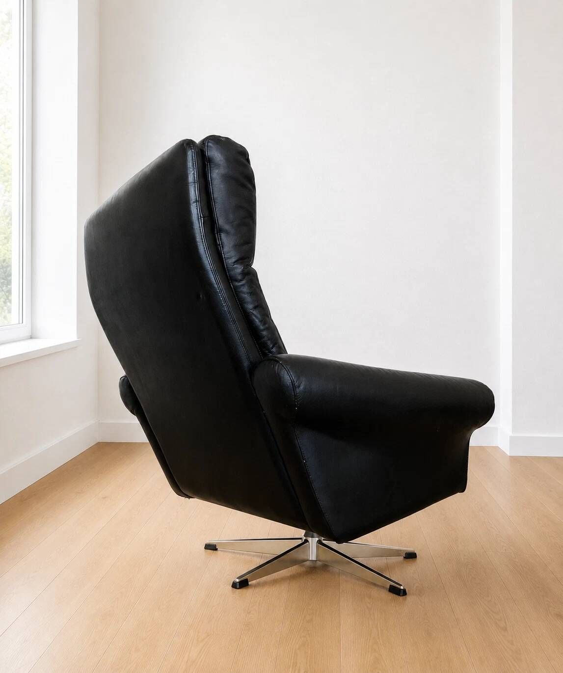 Vintage Danish mid-century black leather swivel chair 1970s
