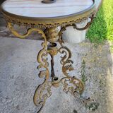 Round table in marble and gilded bronze