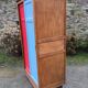 Vintage oak compass foot cabinet with 2 sliding doors painted red and blue