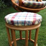 Swivel rattan armchair with matching ottoman