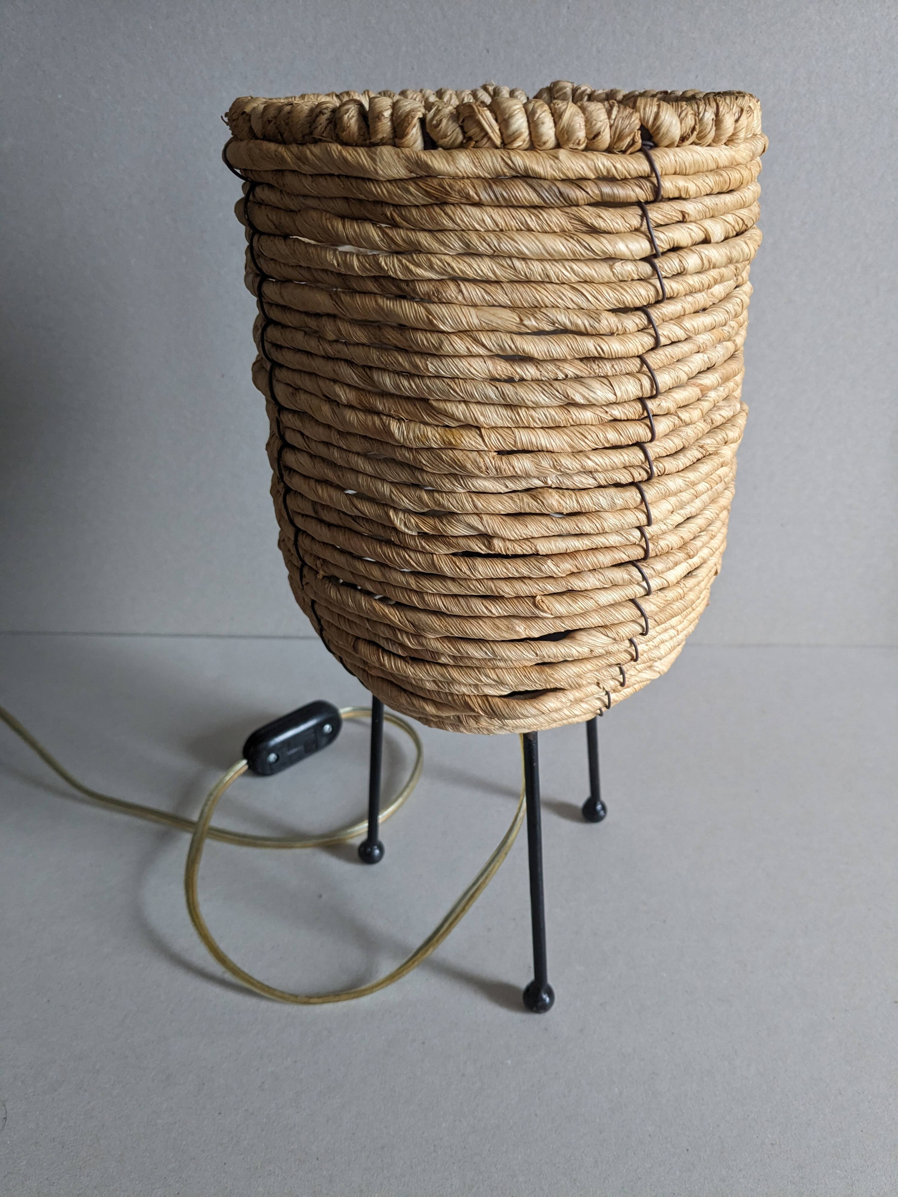 Fiber and metal tripod lamp