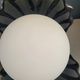 Vintage shell lamp in black porcelain with opaline globe.