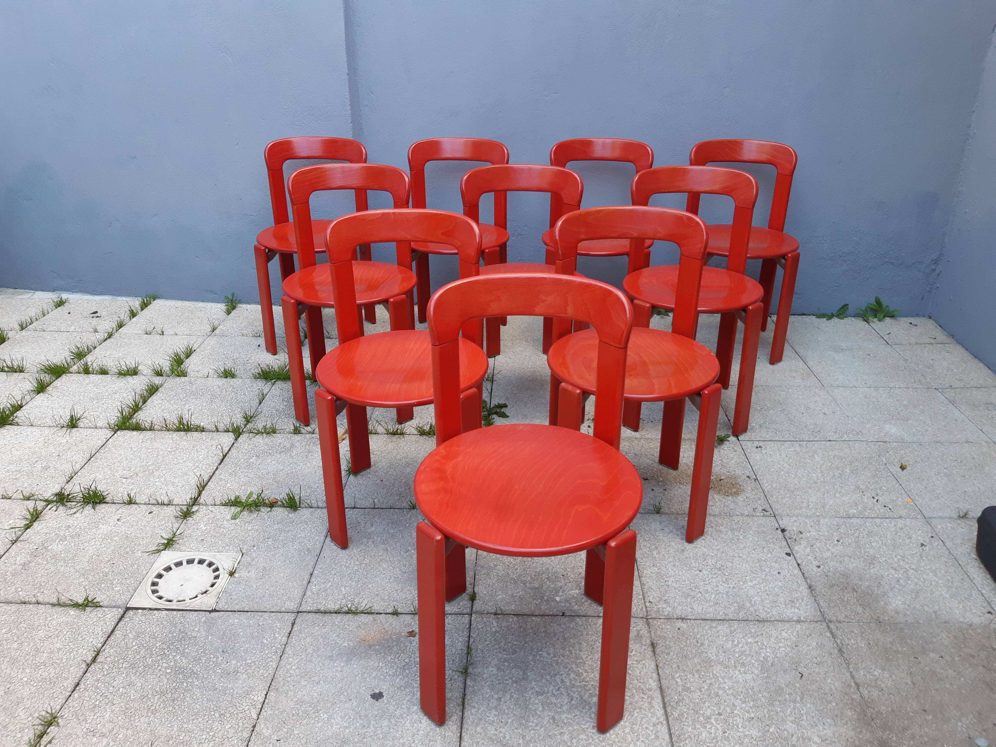 Set of 10 red wooden chairs by Bruno Rey for Kusch&Co