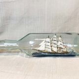 Model boat in glass bottle, 32 cm