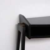 Console italienne en bois laqué noir des années 1950 avec façade de tiroir en laiton